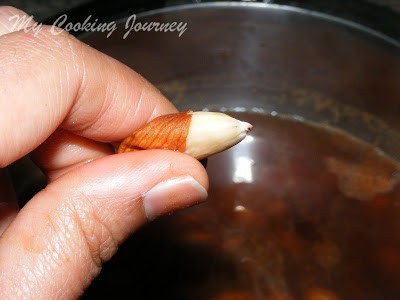 Badam Kheer Peeling Almonds
