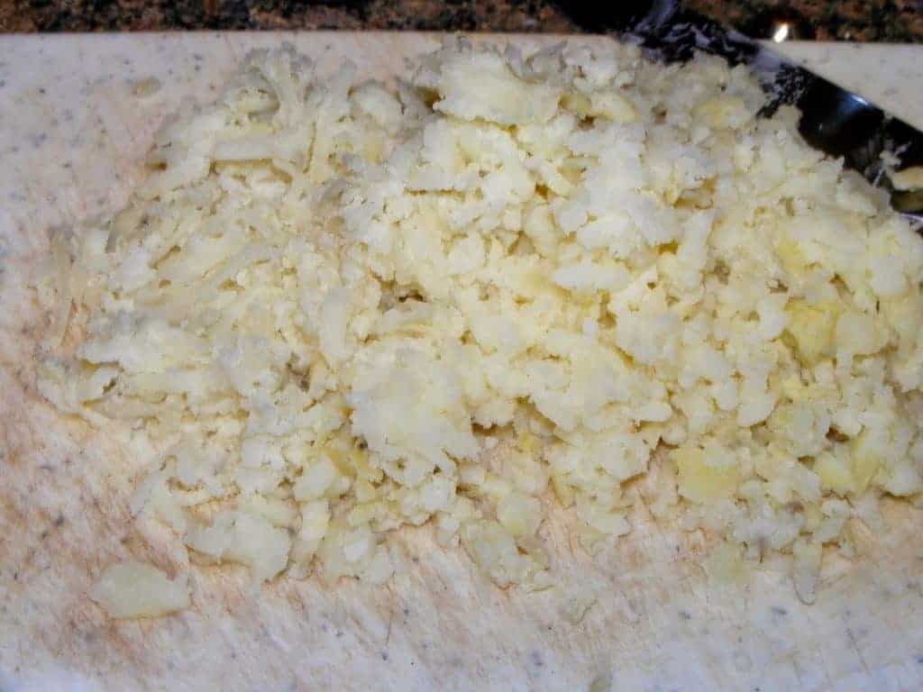 Grated potato for podimas Grated potato for podimas
