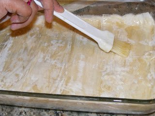 Preparing phyllo sheets for baklava Preparing phyllo sheets for baklava