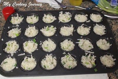 Potatoes filled in muffin tray Potatoes filled in muffin tray