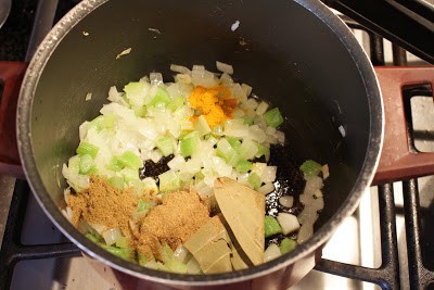 Sauteing onion and celery with spices for soup Sauteing onion and celery with spices for soup