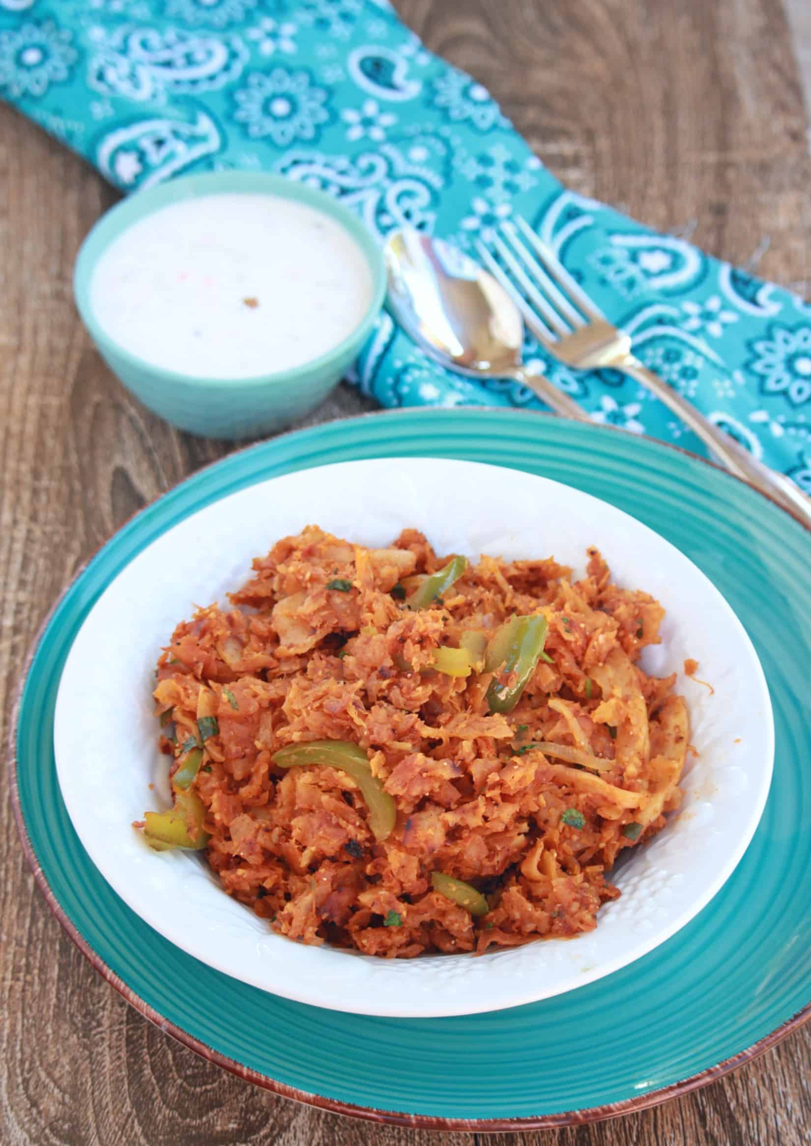 Chili Parotta Chili Parotta and yogurt in background.