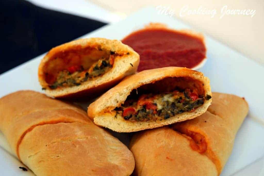 Vegetable Calzones with Onion, spinach and bell pepper filling Vegetable Calzones with Onion, spinach and bell pepper filling
