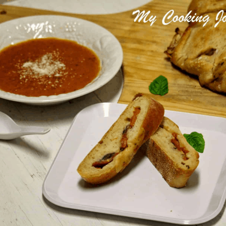 Tomato, Mozzarella And Basil Stuffed Baguettes in a Plate