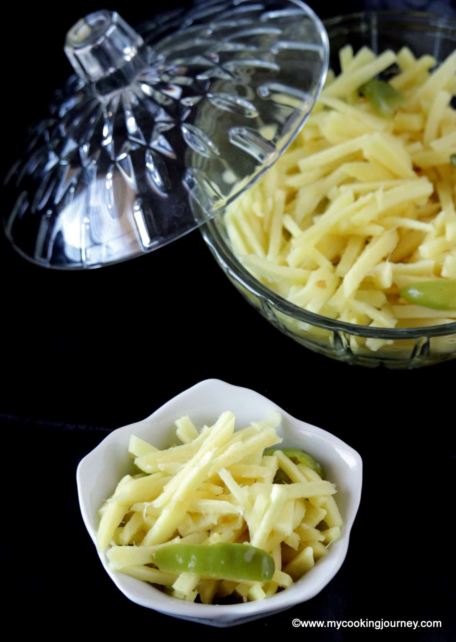 Pickled Ginger with green chilies in a white bowl