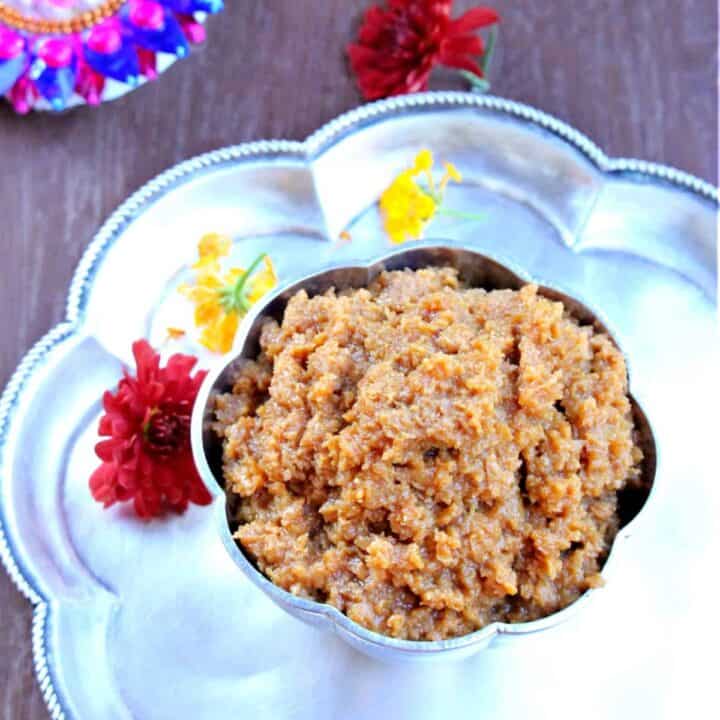 therattipal in a silver bowl and a plate under