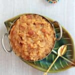 chakkara pongal in a bowl on a green plate