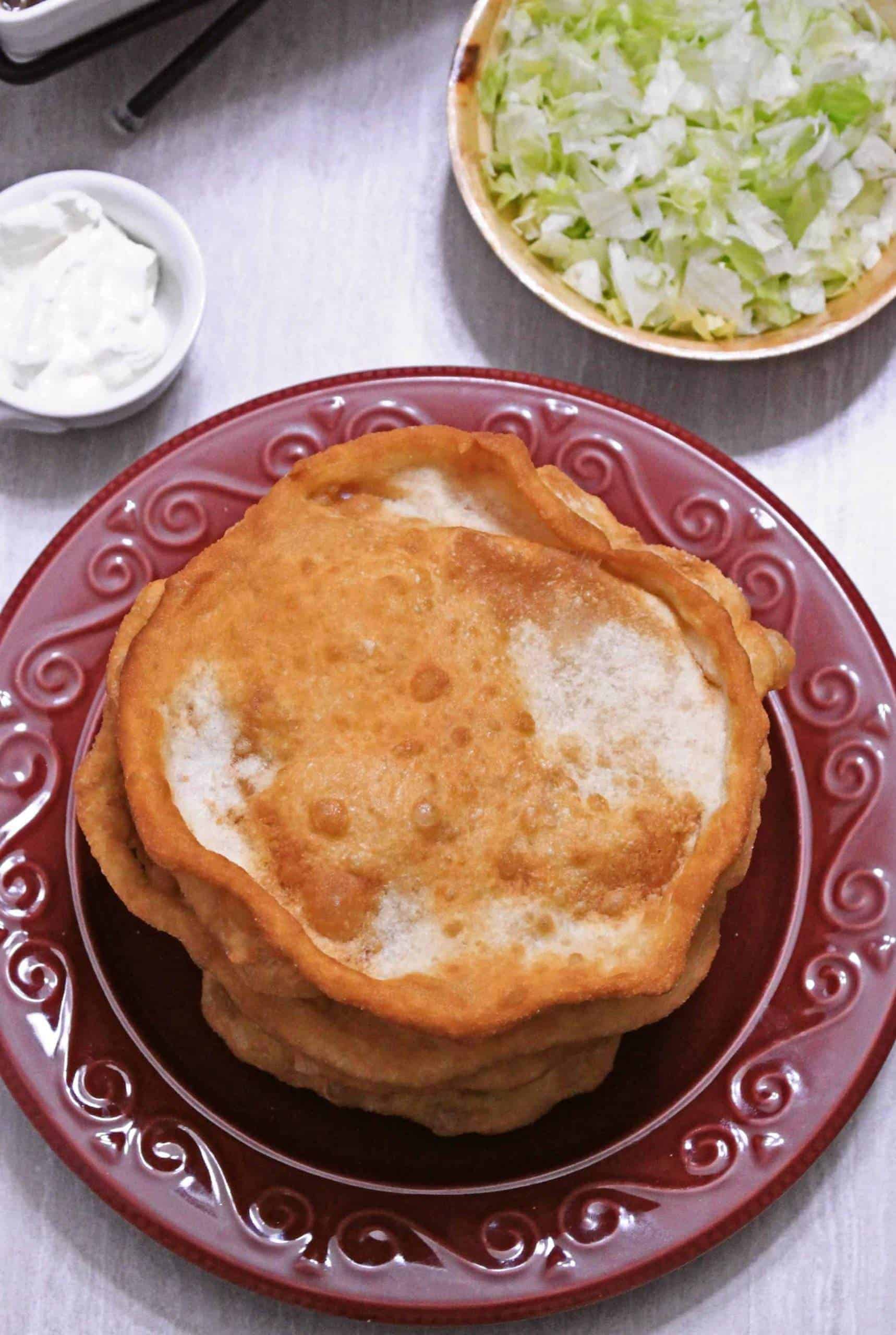 Indian Fry Bread stacked on a plate