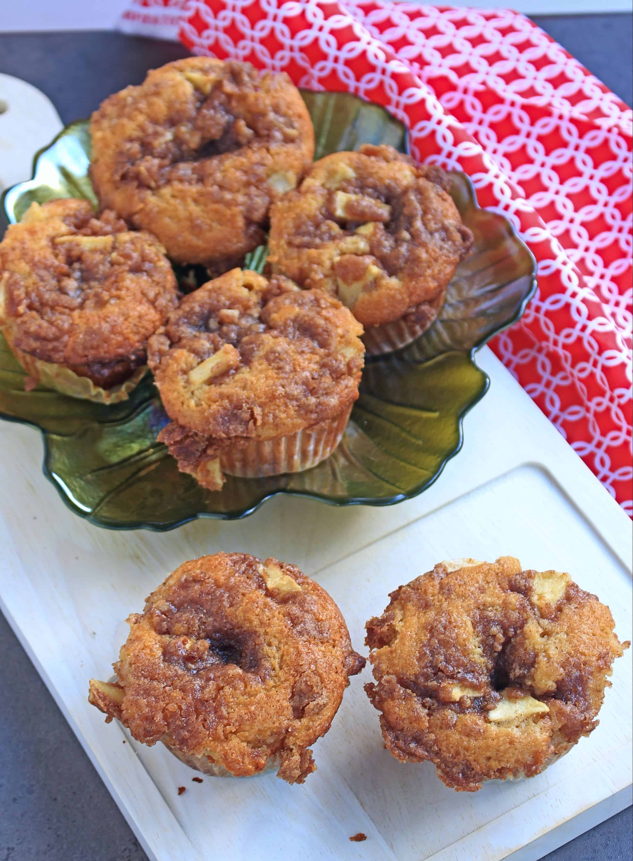 Apple Muffins with Cinnamon Apple Crumb Apple Muffins served in leaf designed plate.