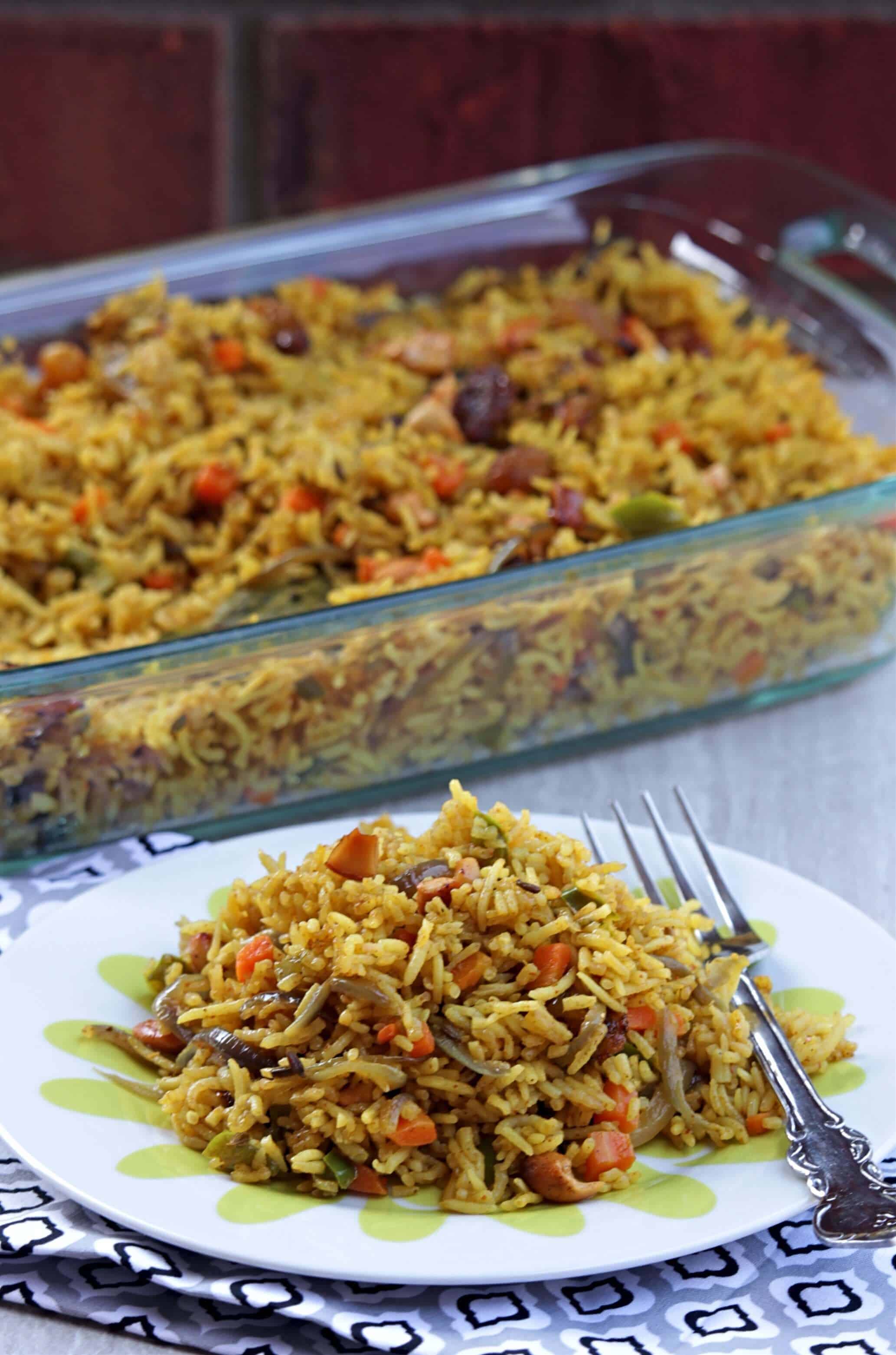 Vegetable Biriyani Vegetable Biriyani in a plate and a casserole