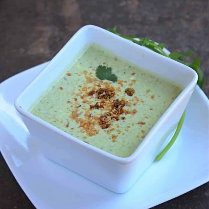 cucumber raita garnished with peanuts