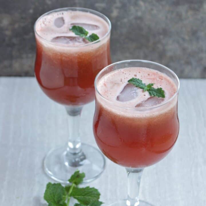 Watermelon and mint juice with mint garnish