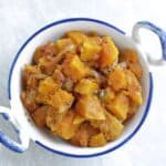 Butternut squash curry in a white bowl