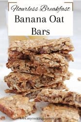 banana oatmeal bars stacked high in a white plate with text