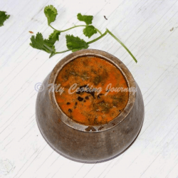 Thakkali Rasam – Tomato Rasam (made in Eeya Sombu) in a pot