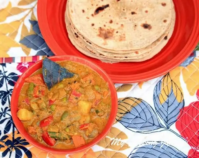 Mixed Vegetable Kurma served in a bowl with roti