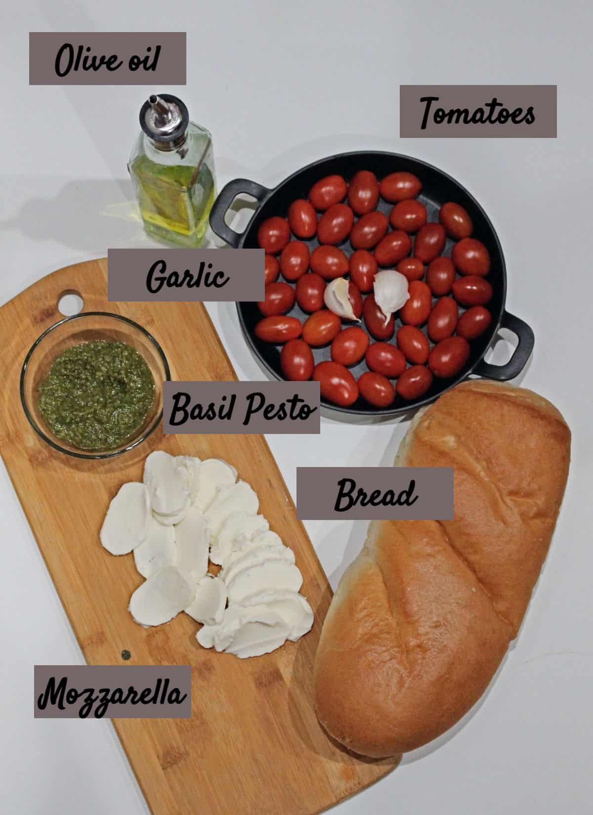 Ingredients needed to make tomato and mozzarella crostini
