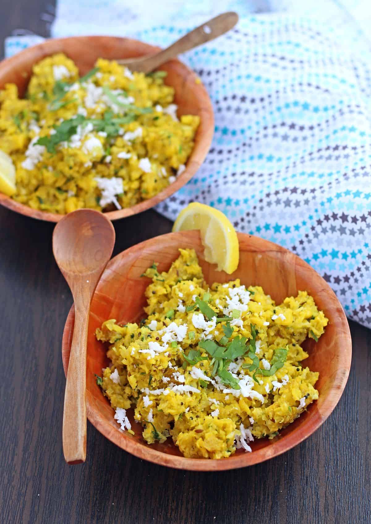 bhutte ka kees in a bowl garnished with cilantro and coconut