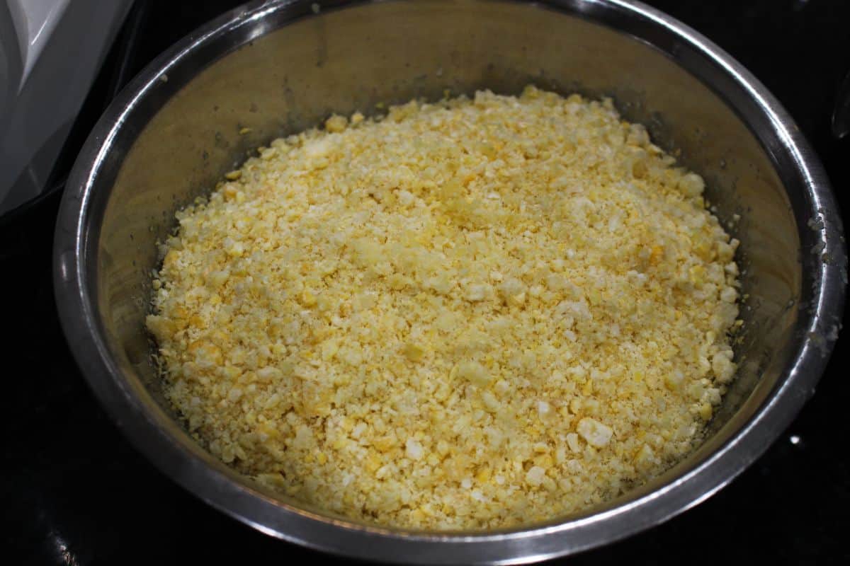 grated corn in a bowl