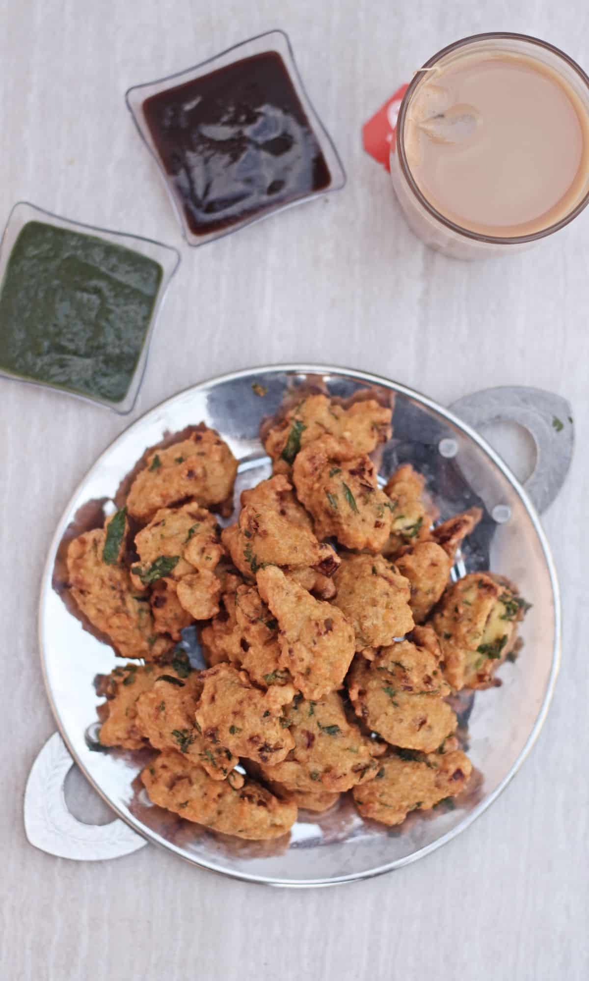 Moond dal vada with sweet chutney and green chutney and tea