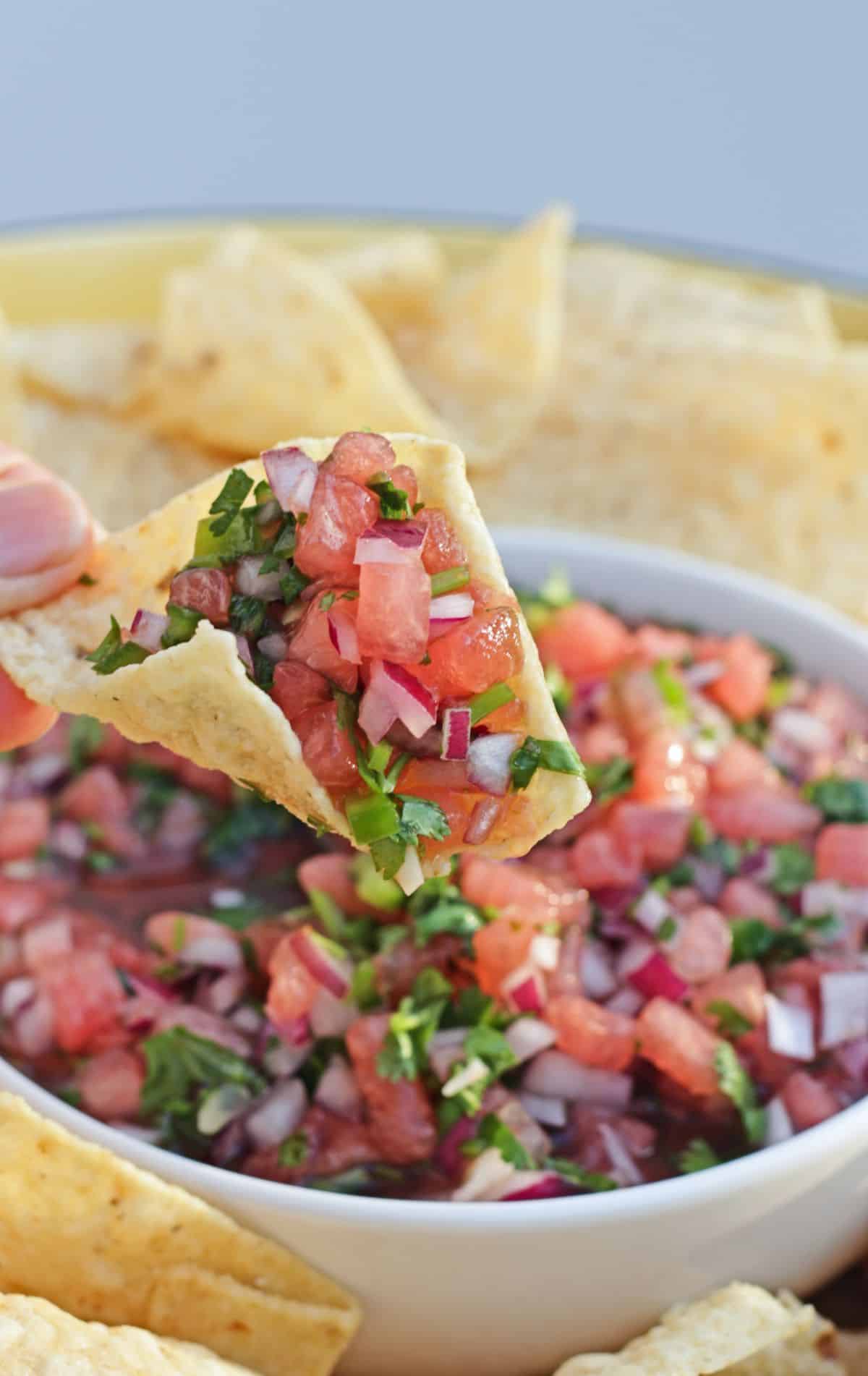 watermelon salsa scooped on a chip