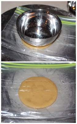 Using a flat bottom bowl to flatten the adhirsam dough