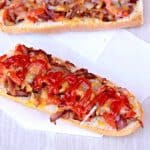 Open sandwich with cheese and ketchup