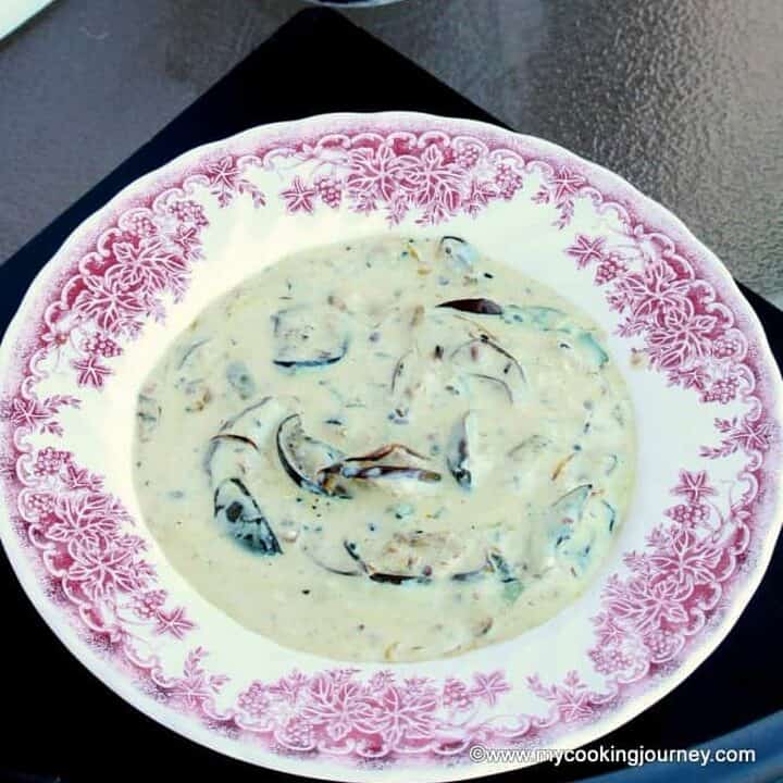 Dahi Baingana in a white bowl - Featured Image