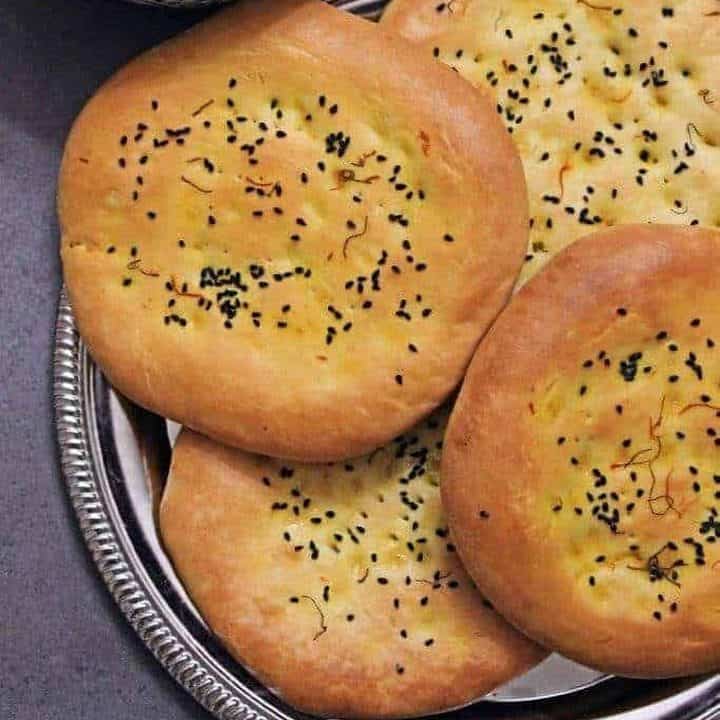 Taftan bread stacked in a plate - featured image