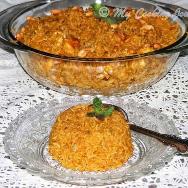 Paneer Pulao in a plate with some on a bowl in the side - Featured Image
