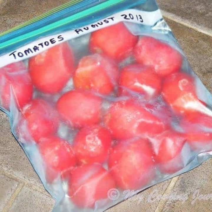 Frozen Tomatoes in a Freezer bag - Featured Image