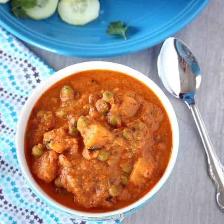 Shahi Aloo Mutter Subzi in a white bowl - Featured Image