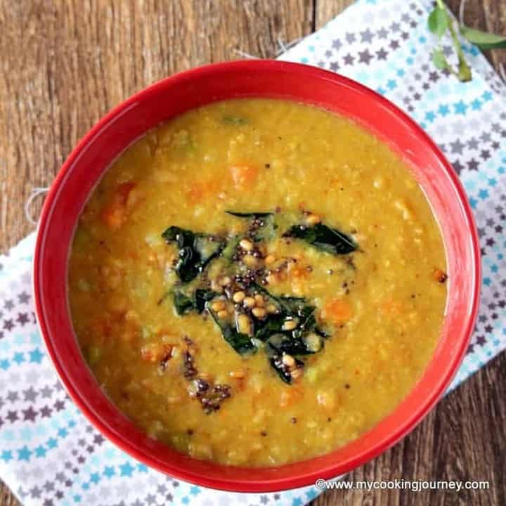 Mixed Vegetable Poricha Kuzhambu in a red bowl - Featured Image