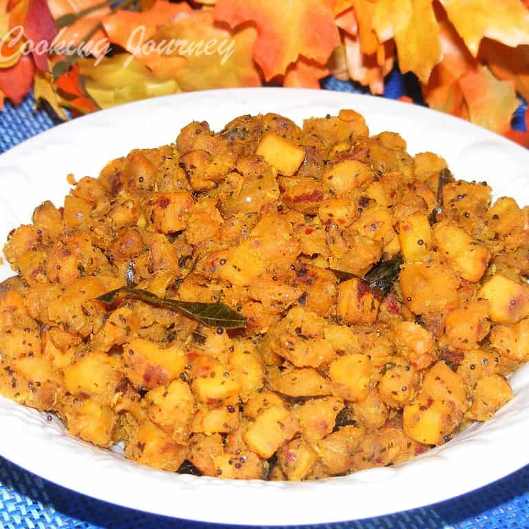 Spiced Sweet potato curry in a white bowl - Featured Image