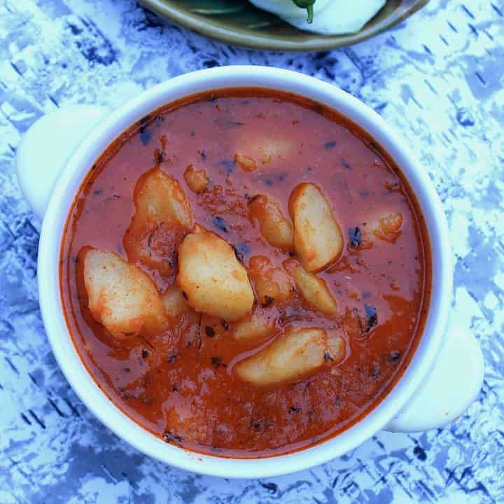 Aloo Kasure Methi Rasedar Subzi in white bowl - Featured Image