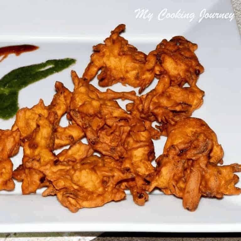 Onion Bhajias in a plate - Feature Image
