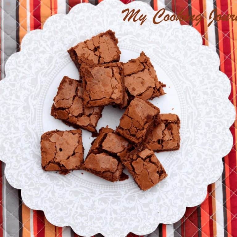 Classic brownies on a paper tray - Feature Image
