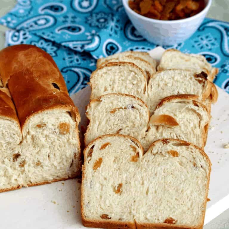 Irish Freckle Bread sliced on a board - Feature Image